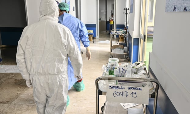 Medical workers in the infectious diseases department at Cannizzaro hospital in Catania, Sicily in April. Photograph: Fabrizio Villa/Getty Images