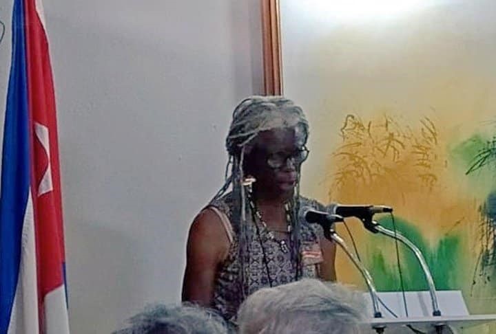Black Woman Speaking at a podium