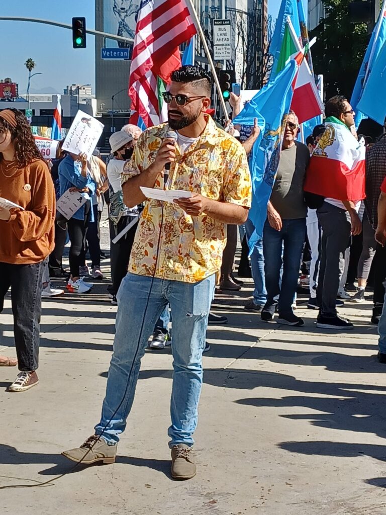 ELAM graduate Steve Singh at LA rally against US blockade of Cuba- photo Walter Lippman