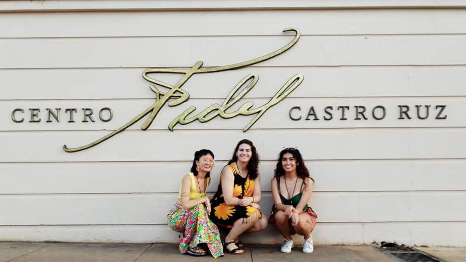 three women in front of fidel castro memorial building in Cuba